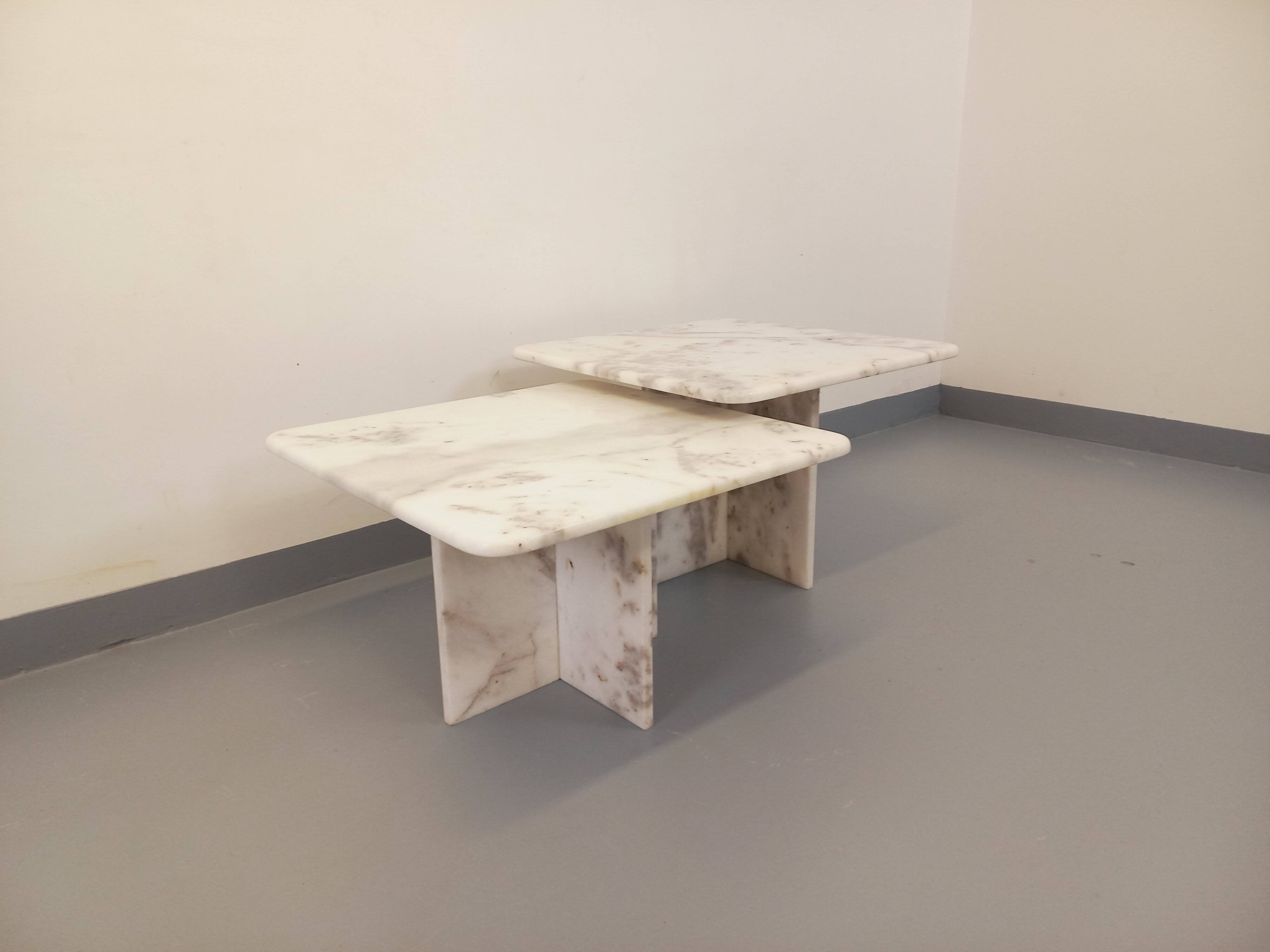 Pair of vintage nesting coffee tables in white marble from the 1970s.