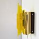 Yellow acrylic and metal wall lamp by Claus Bolby for Cebo Industri, Denmark 1960's