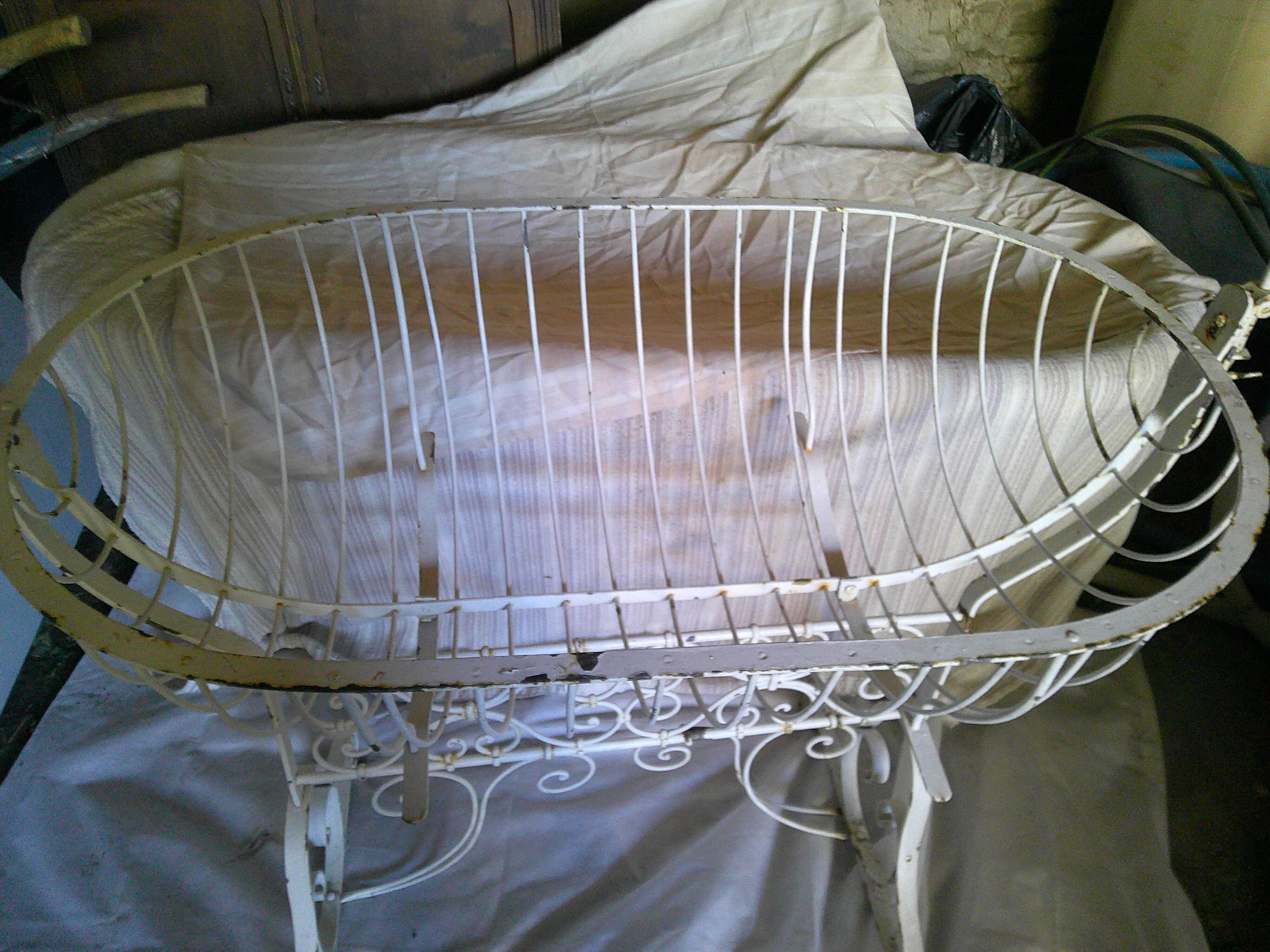 Wrought iron rocking cradle