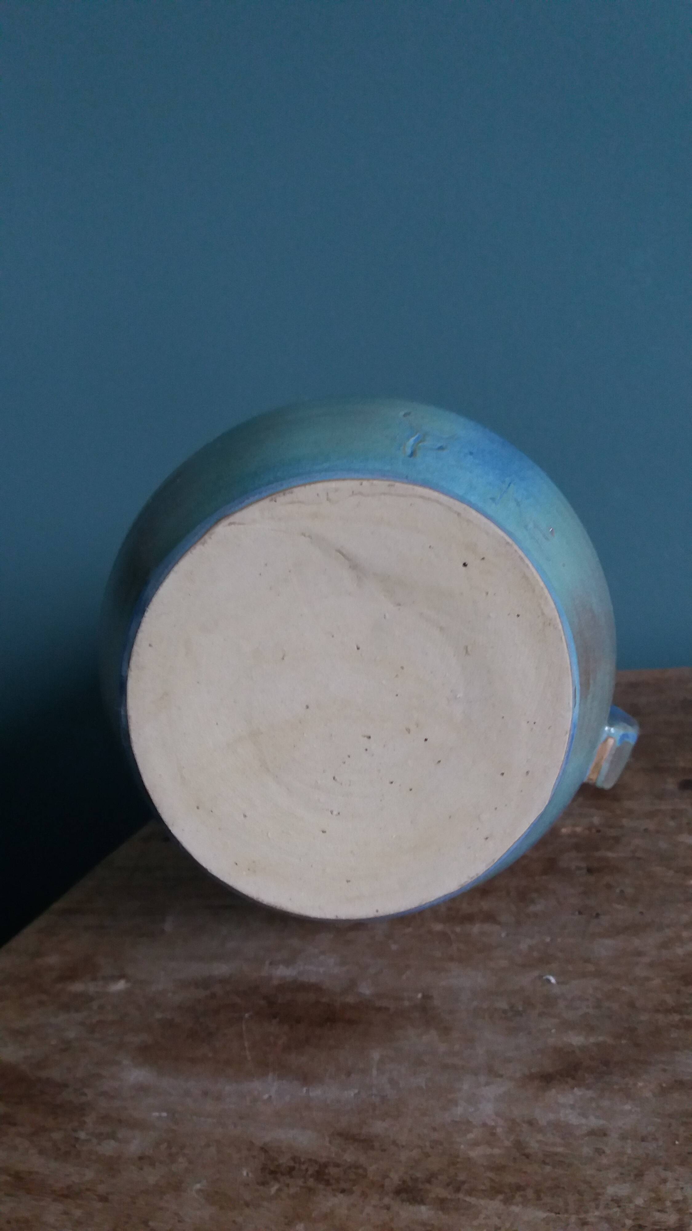 Enamel pitcher in pastel blue and green, signed