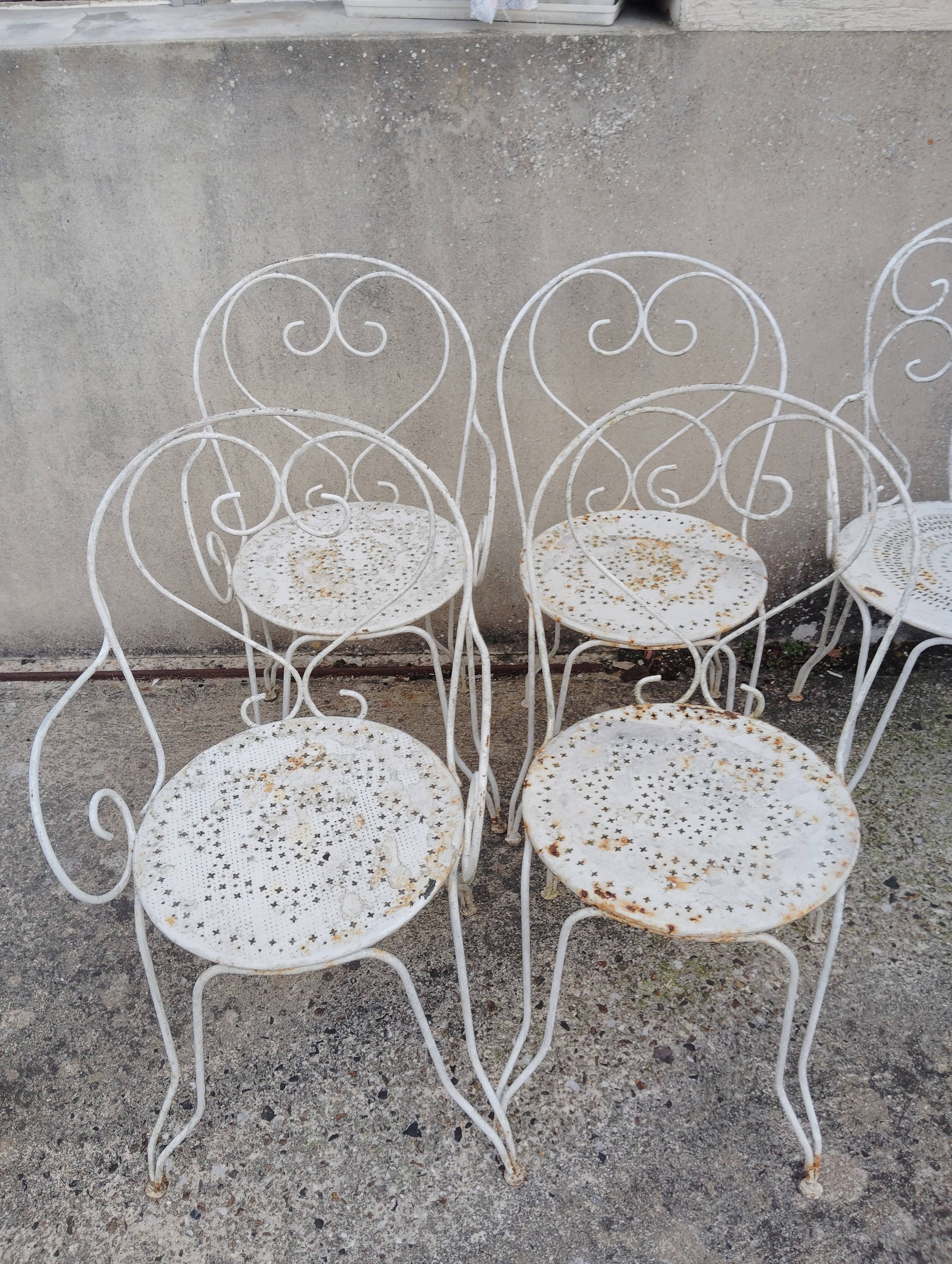 Wrought iron garden furniture from the early 20th century.