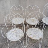 Wrought iron garden furniture from the early 20th century.