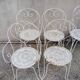 Wrought iron garden furniture from the early 20th century.
