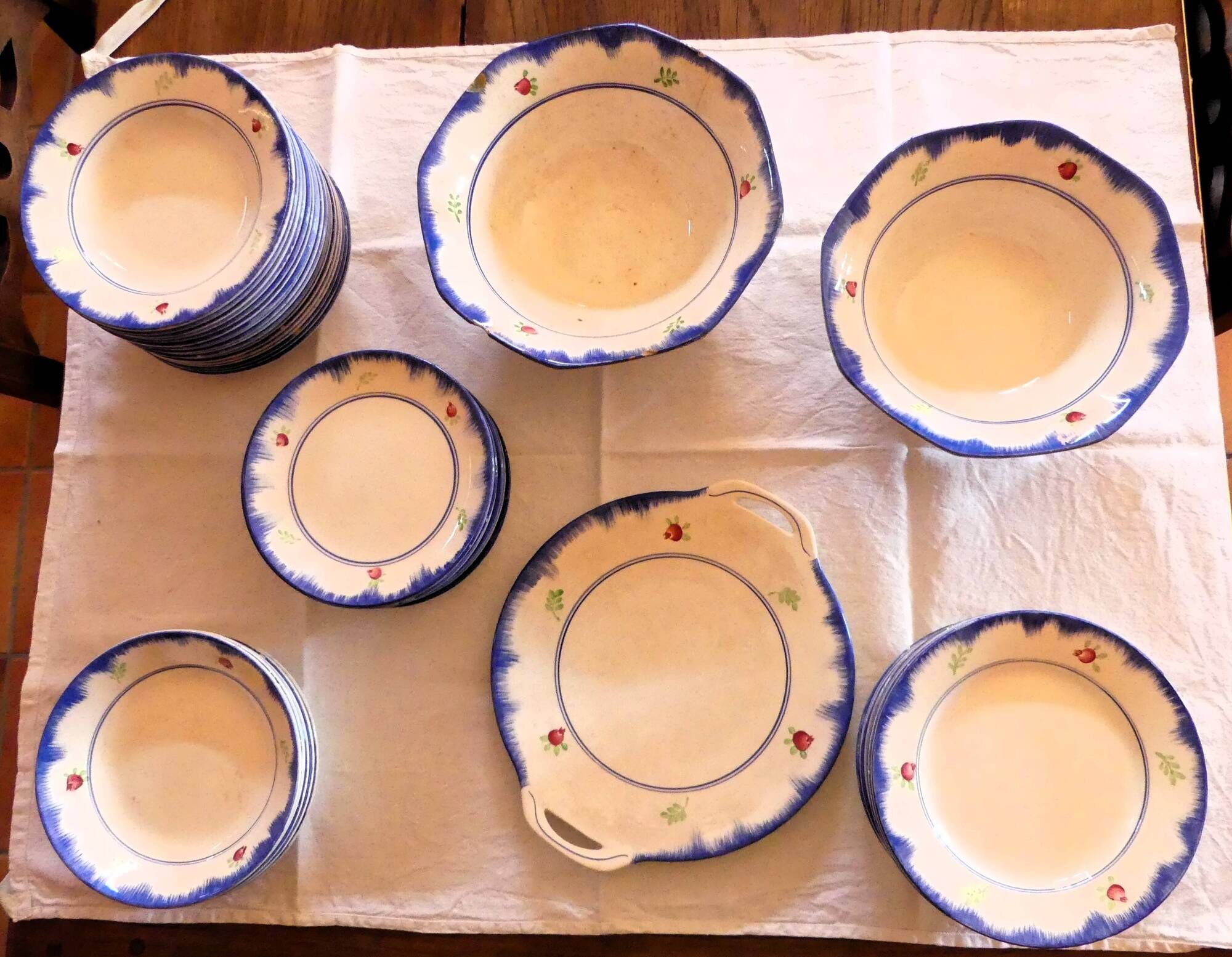 Service of 53 pieces from Gien, model "Bagatelle" (plates, dishes, salad bowls)