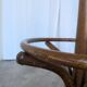 Vintage bentwood coat rack in Thonet style / Dark wood coat rack with shadow.