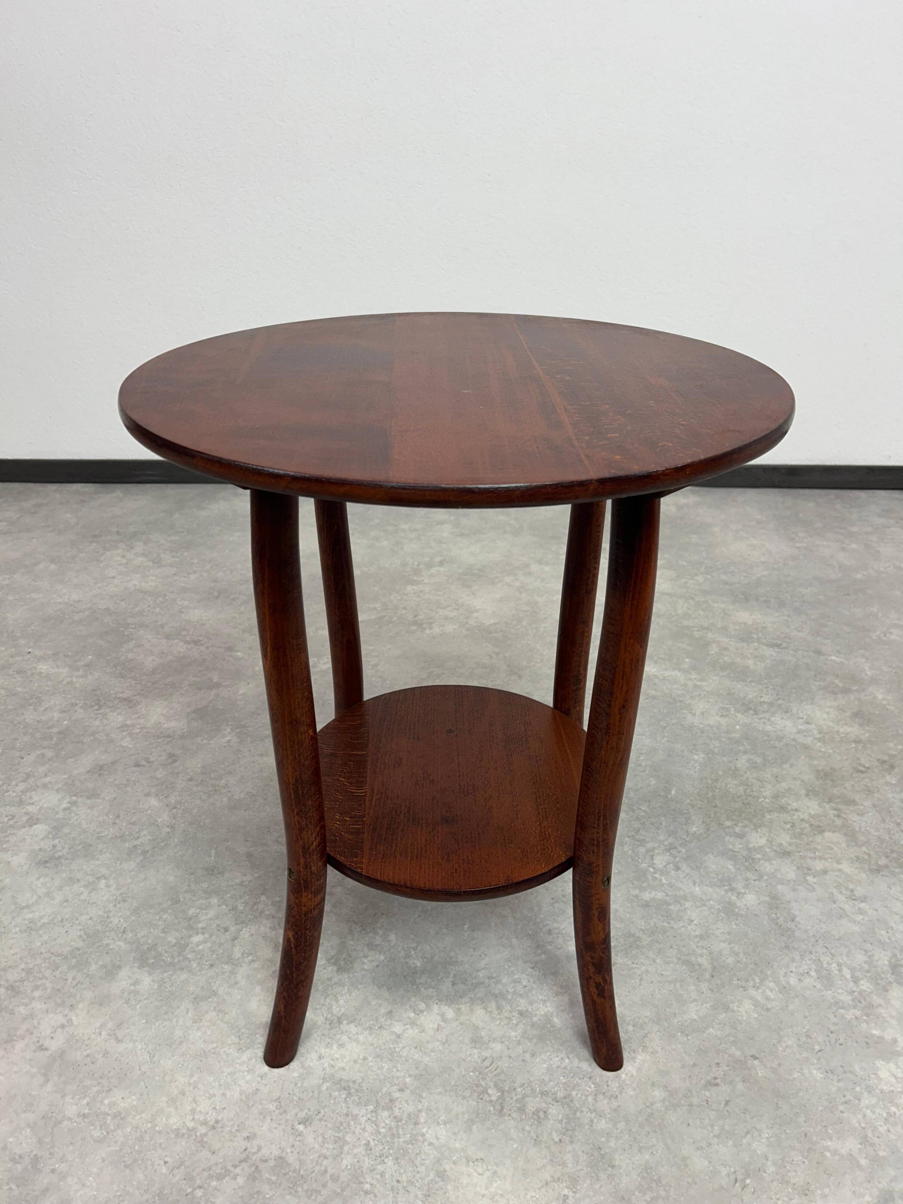 Curved wooden coffee table by Thonet