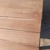 Low farmhouse table in raw wood