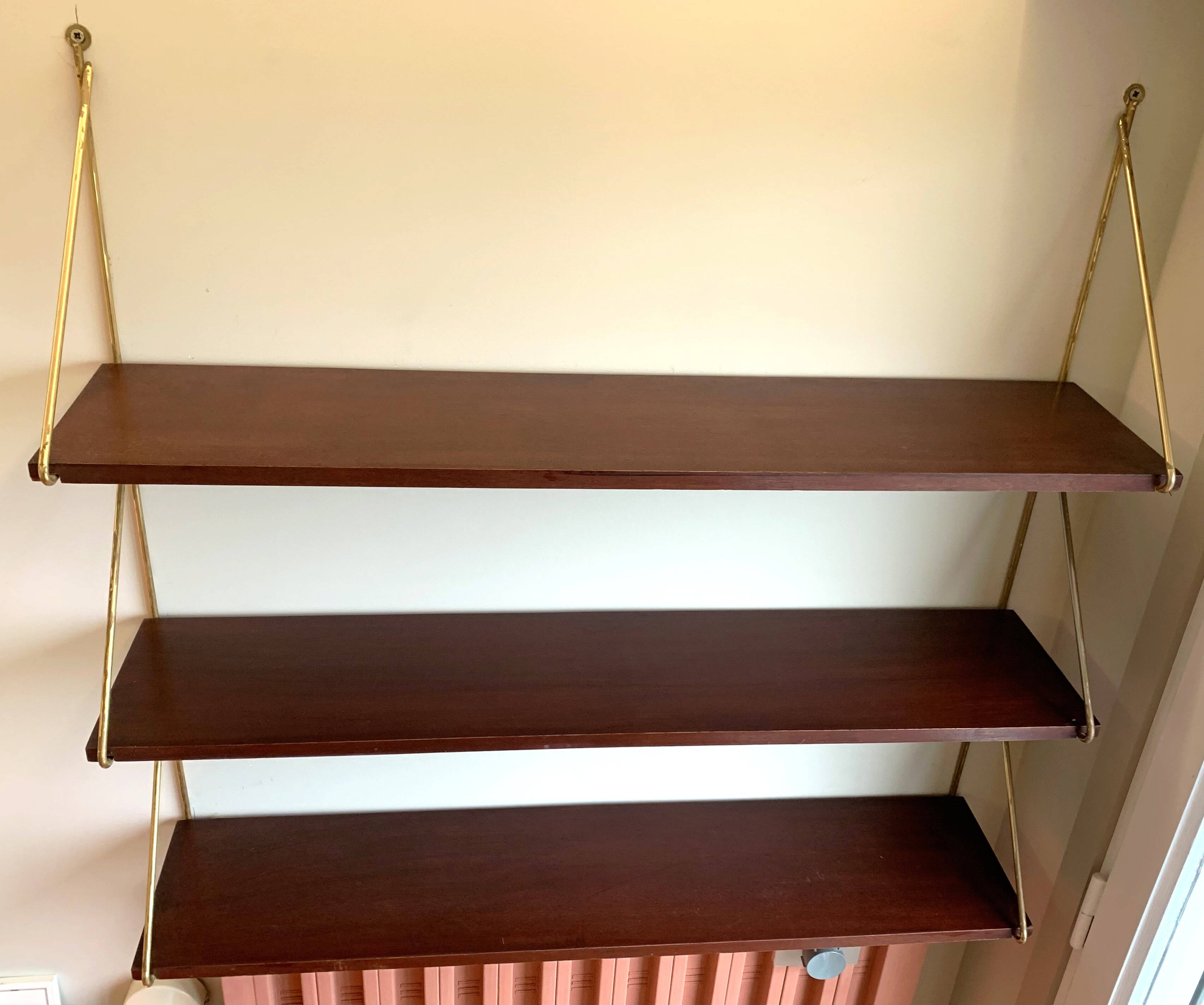 Scandinavian wall-mounted bookcase with floating rosewood shelves, period