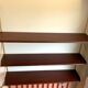Scandinavian wall-mounted bookcase with floating rosewood shelves, period