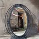 Miroir ovale vintage en fer forgé à décor de spirales