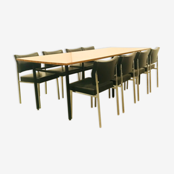 Conference table and eight vintage chairs in imitation leather XX century