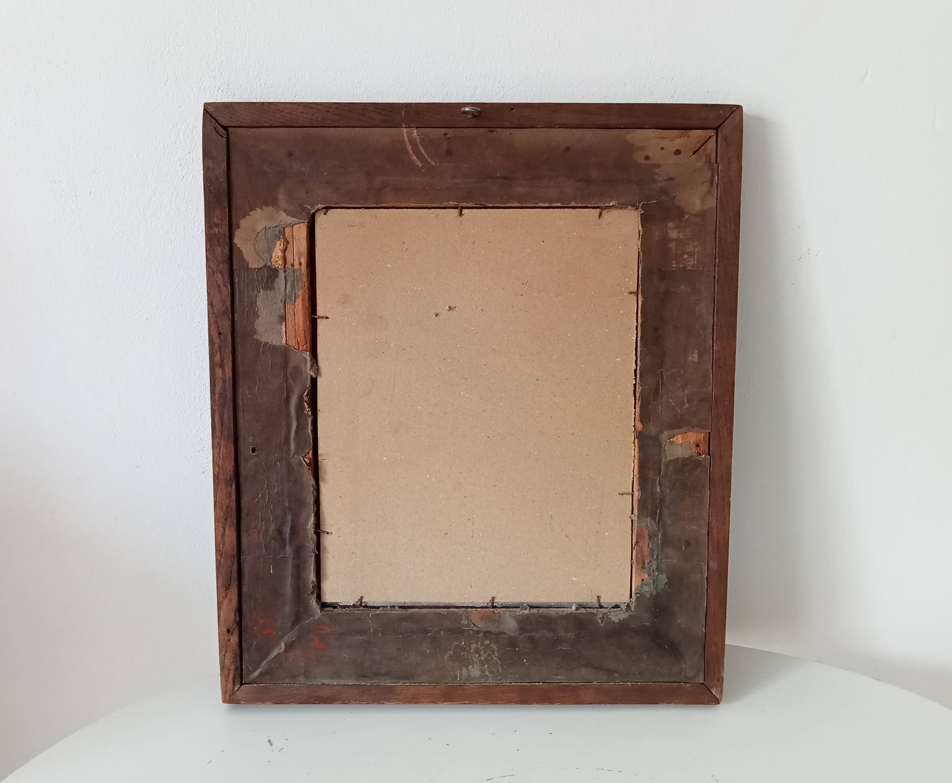 Antique mirror in carved wood