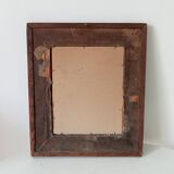 Antique mirror in carved wood