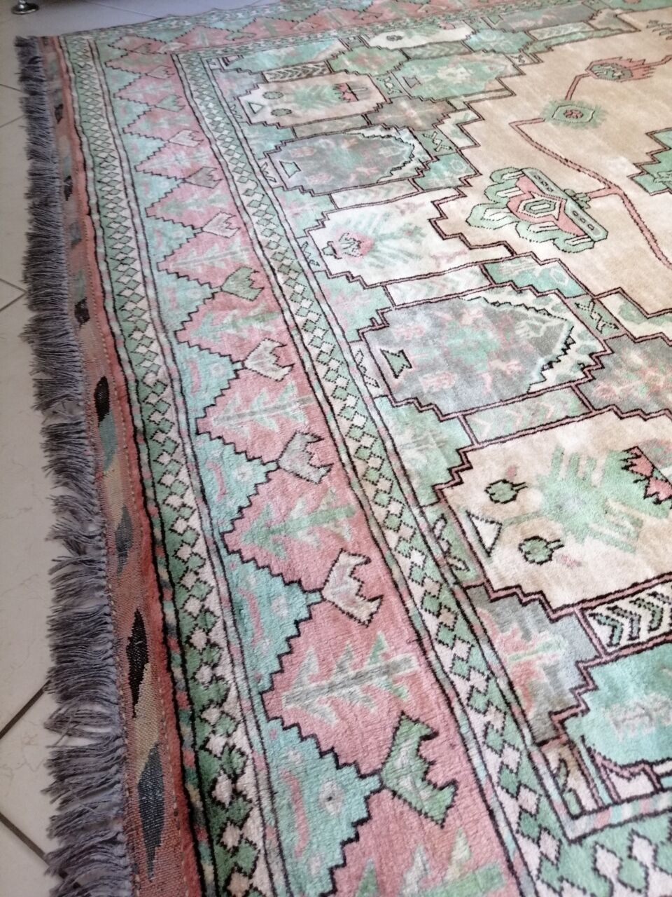 Afghan rug in pastel colors