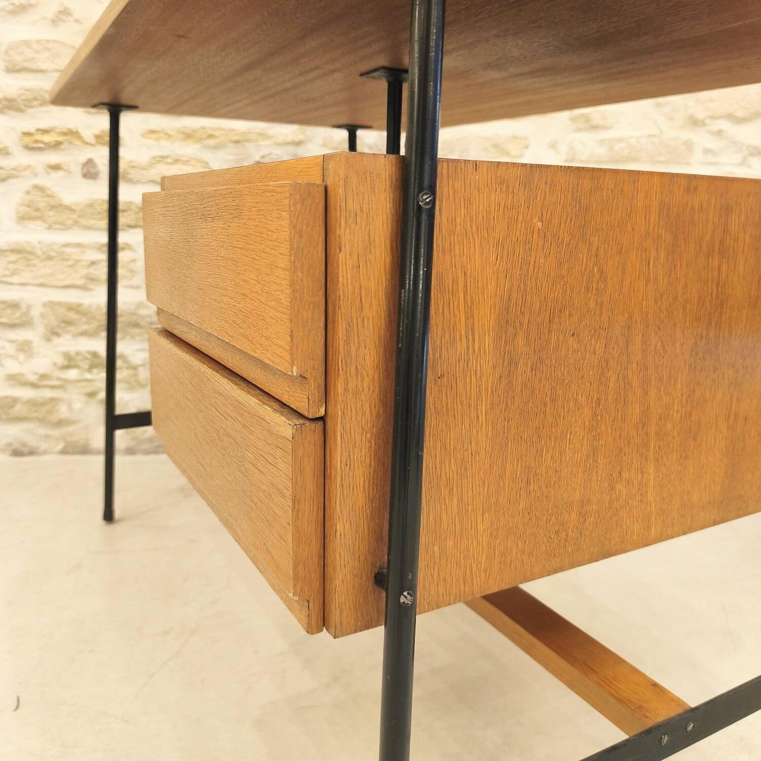 Modernist desk with suspended drawer unit, French work from the 1950s.
