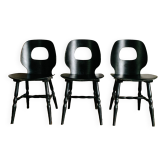 Ensemble de 3 chaises noires modèle œil de Baumann