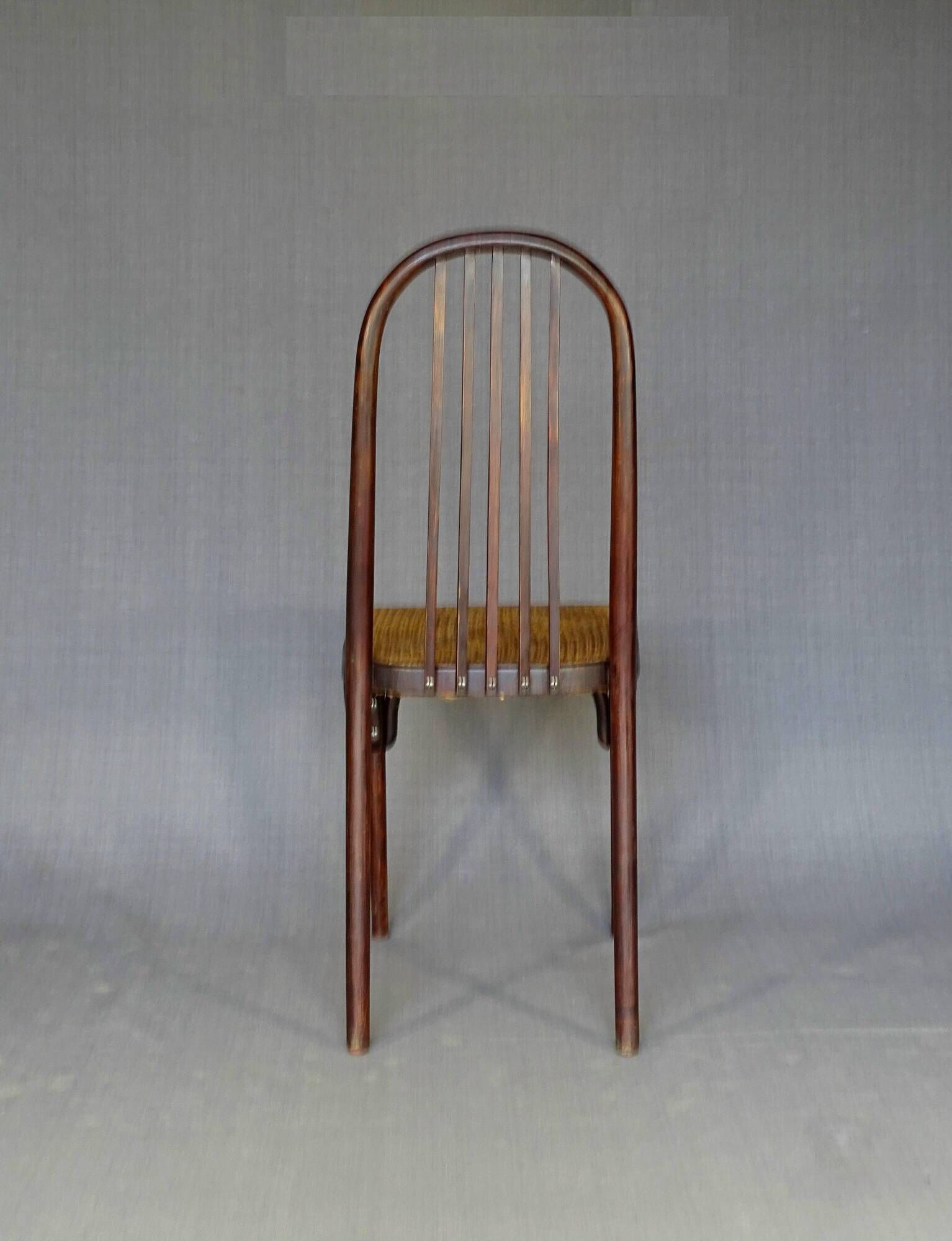 Bistro chair with curved wood by Wojciechow No. 644, not Thonet.