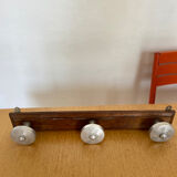 Vintage wood and aluminum patere