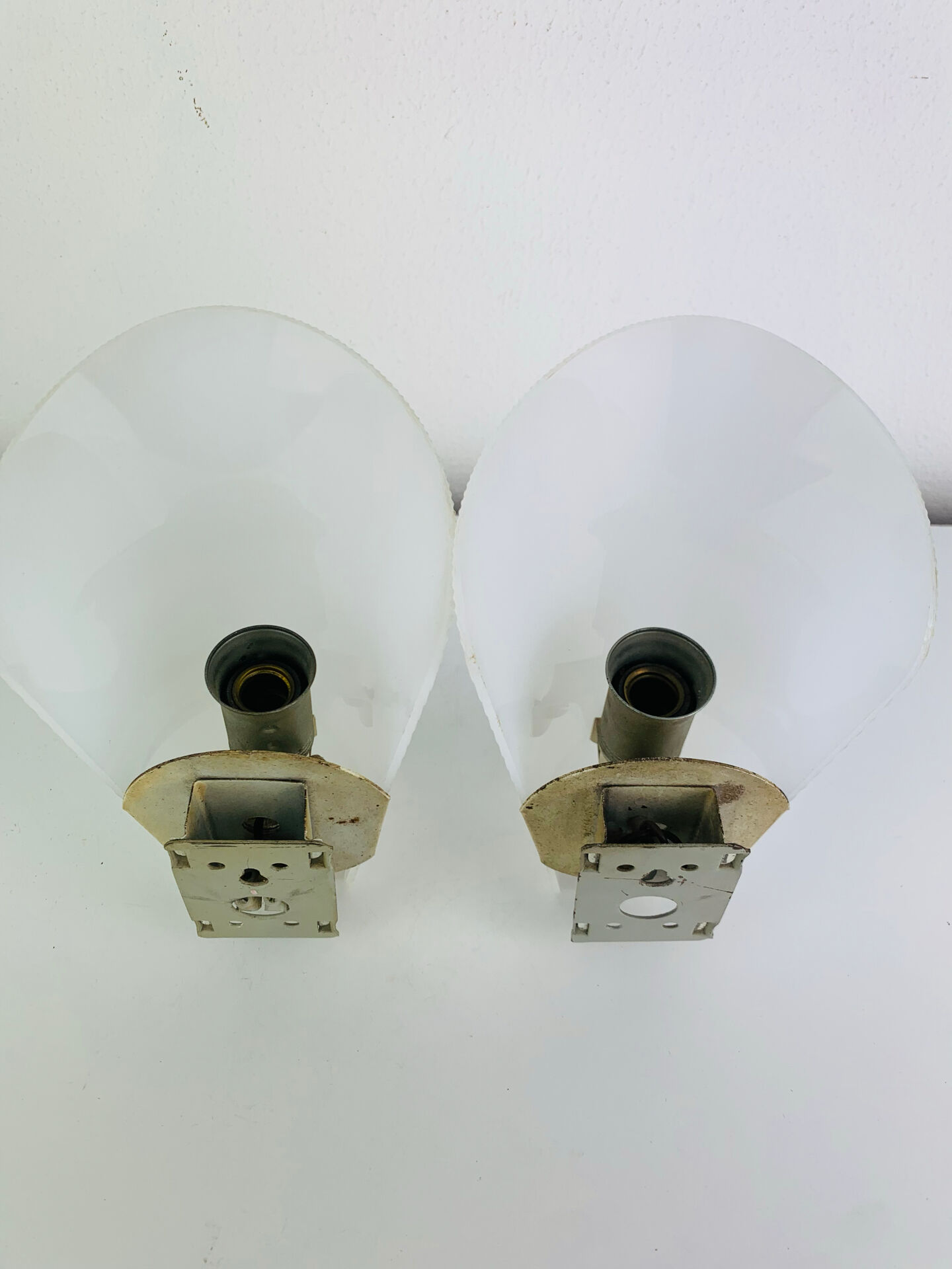 Pair of 1950s striped plastic wall lights.