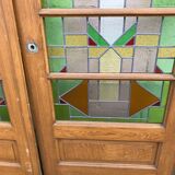 Series of three doors with stained glass windows
