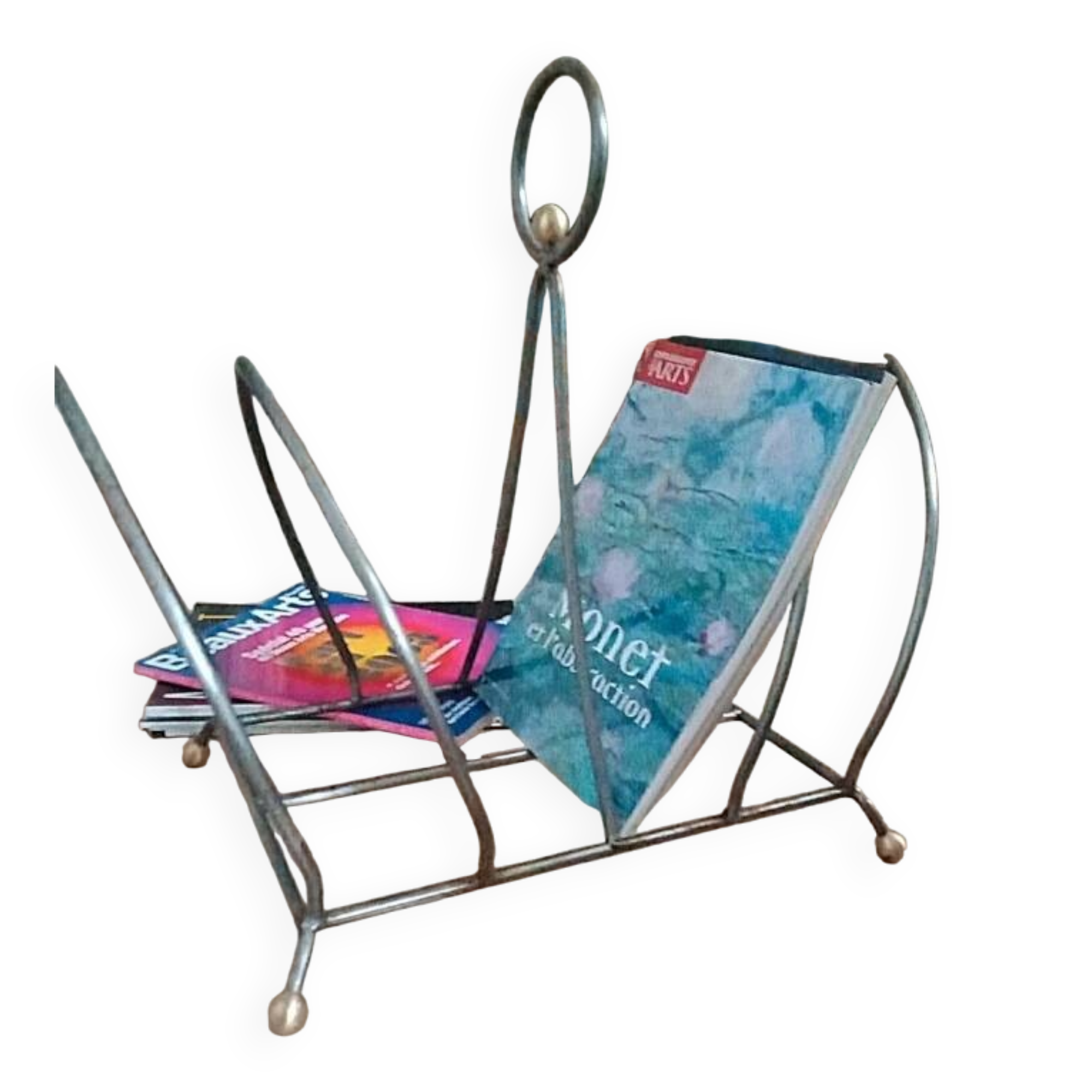 Vintage magazine rack with brass legs