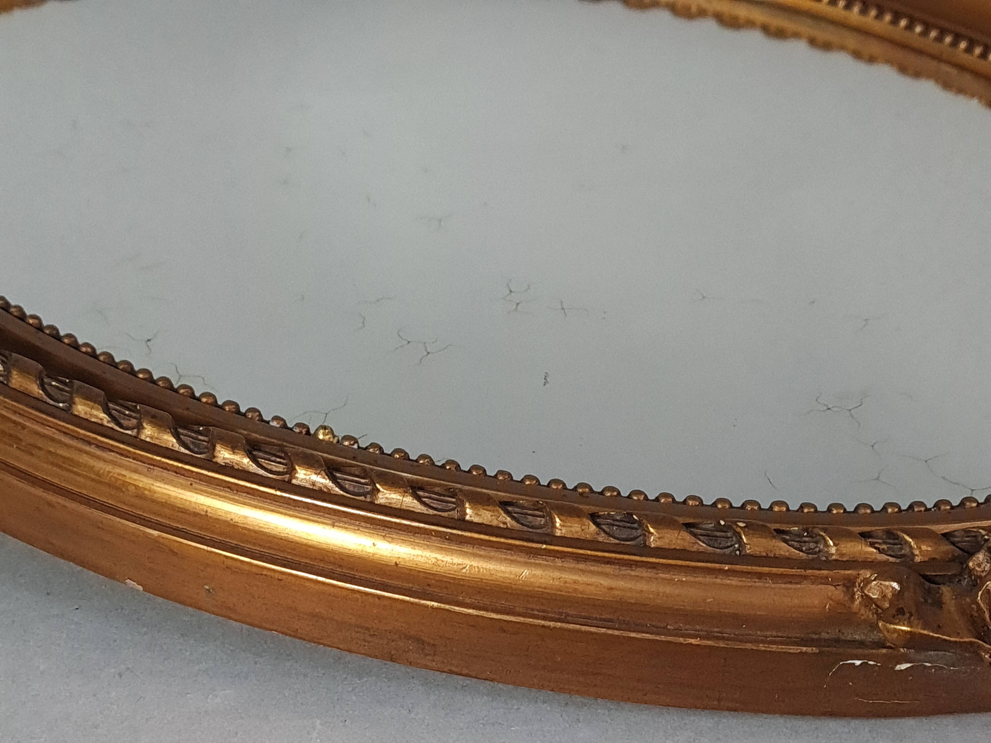 Miroir ovale cadre ancien style Louis XVI bois stuc doré d'origine 52x37 cm