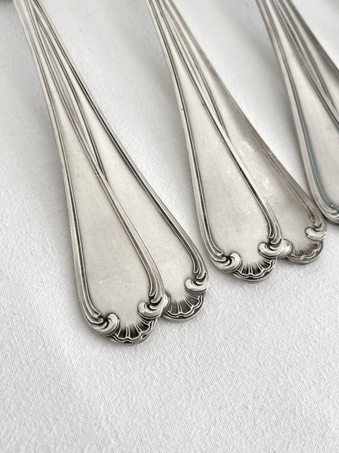 12 antique silver plated shell soup spoons