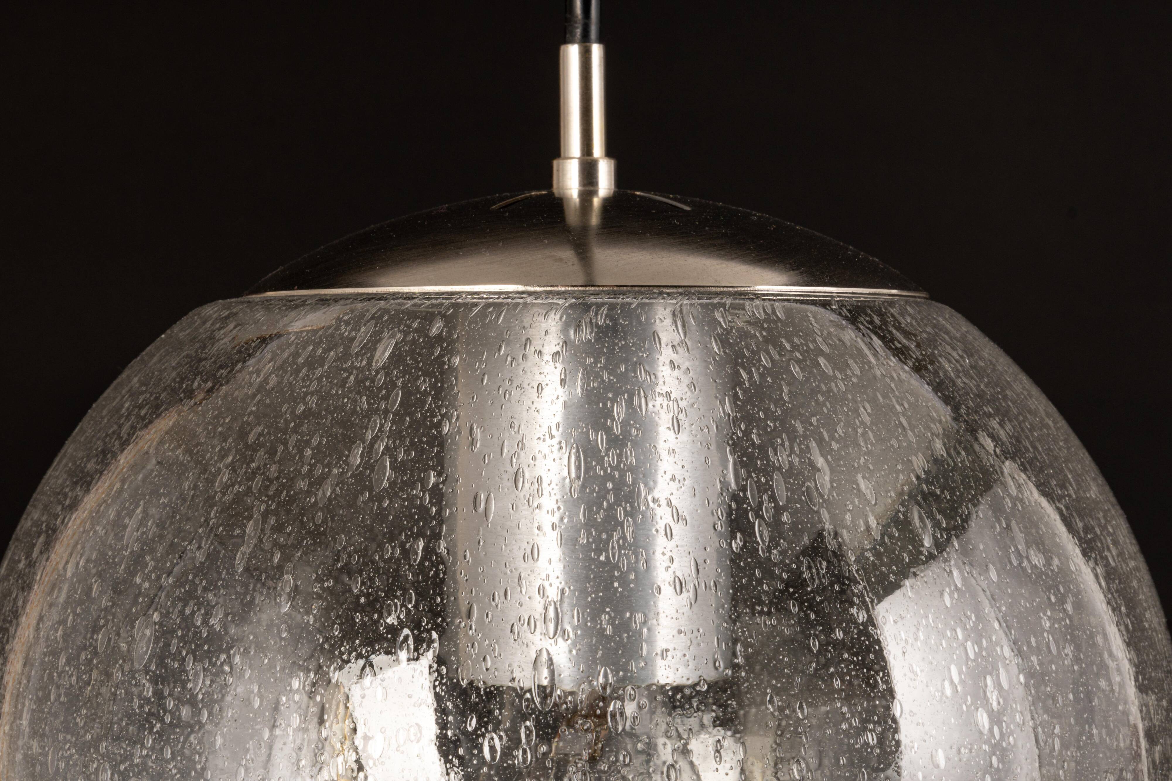 Small Limburg chrome pendant light with transparent glass ball, Germany, 1970s.