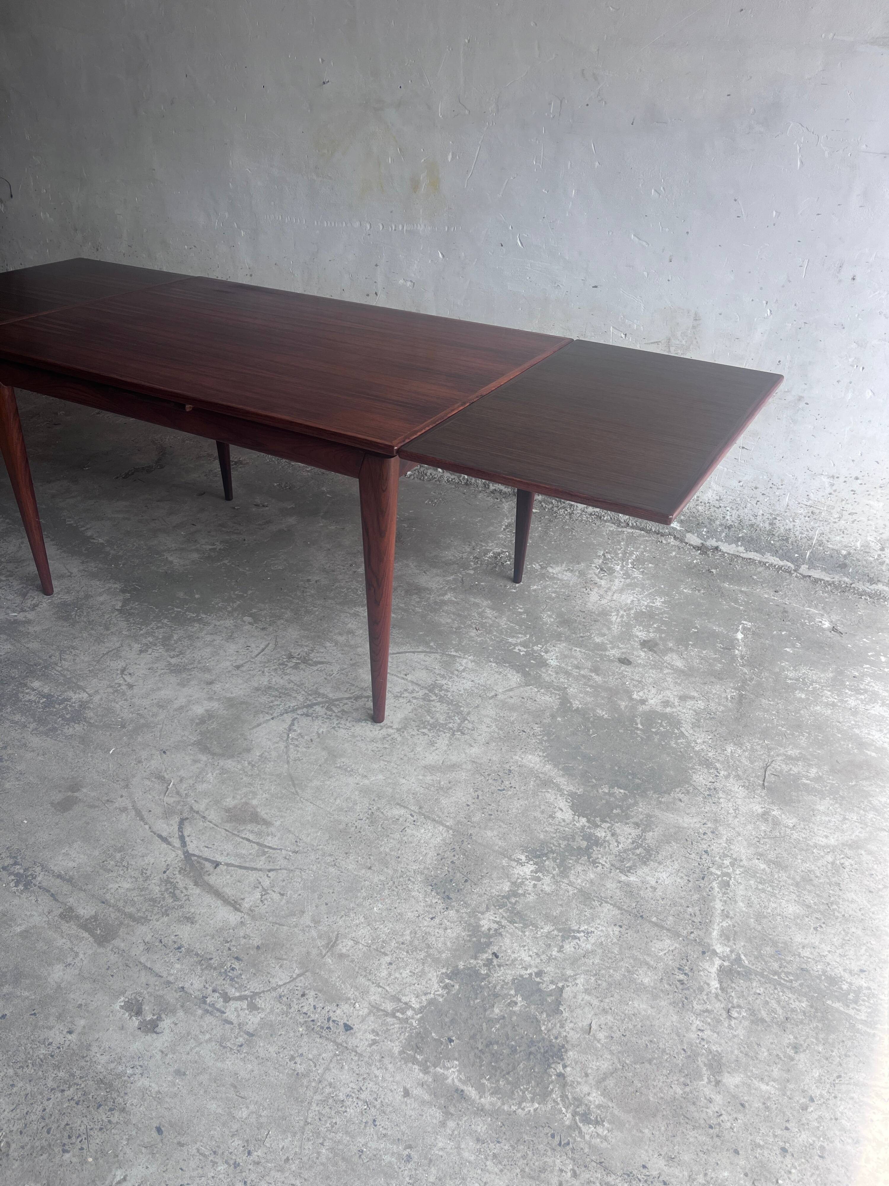 Danish extendable dining table in rosewood by Niels O. Møller, model 254, Denmark, 1960s.