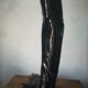 Black earthenware vase gloved hand