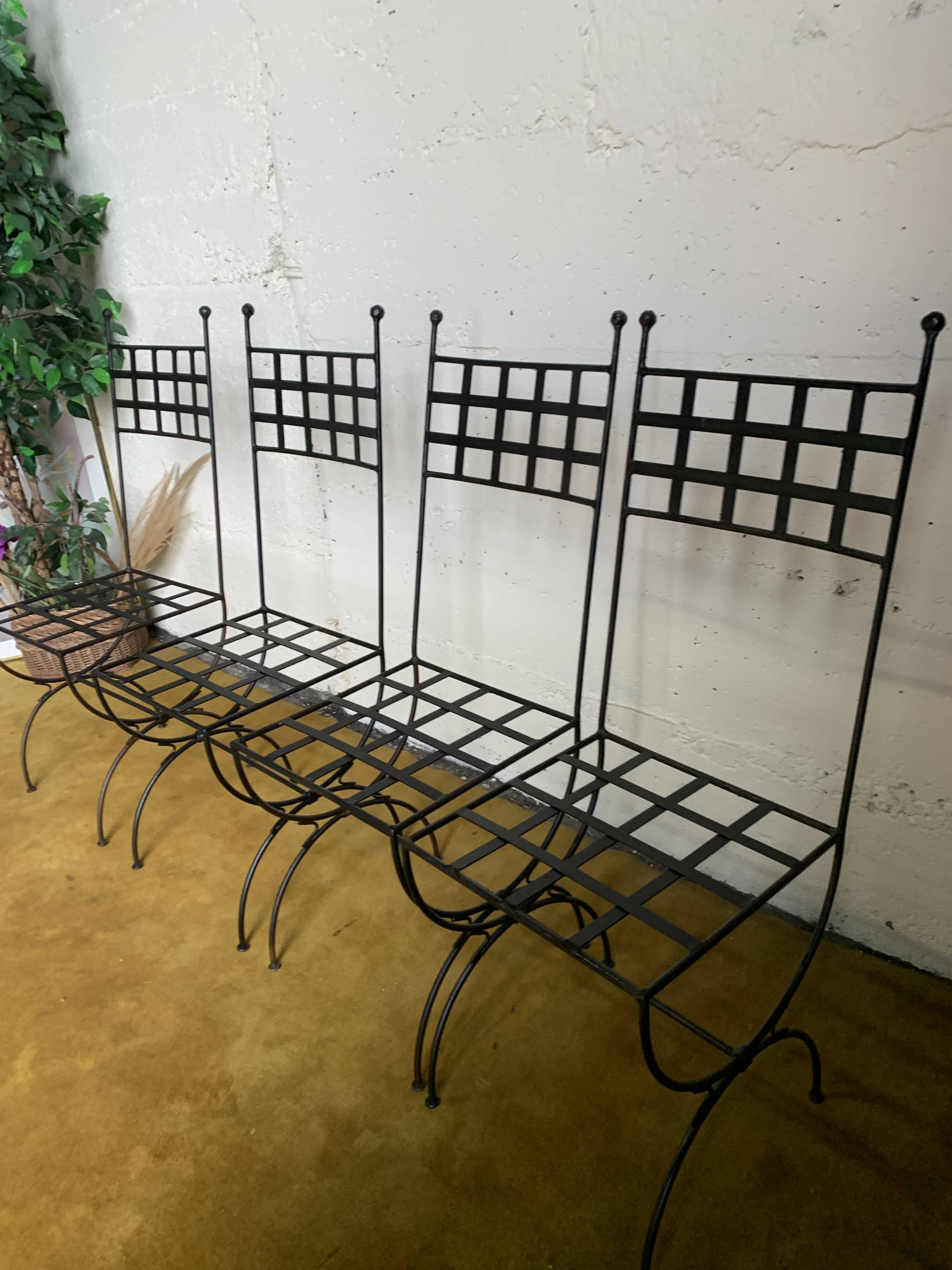 4 black wrought iron chairs for Philipine pro