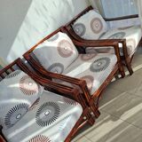 Salon vintage Maison Maugrion en rotin et finitions cuir et plume