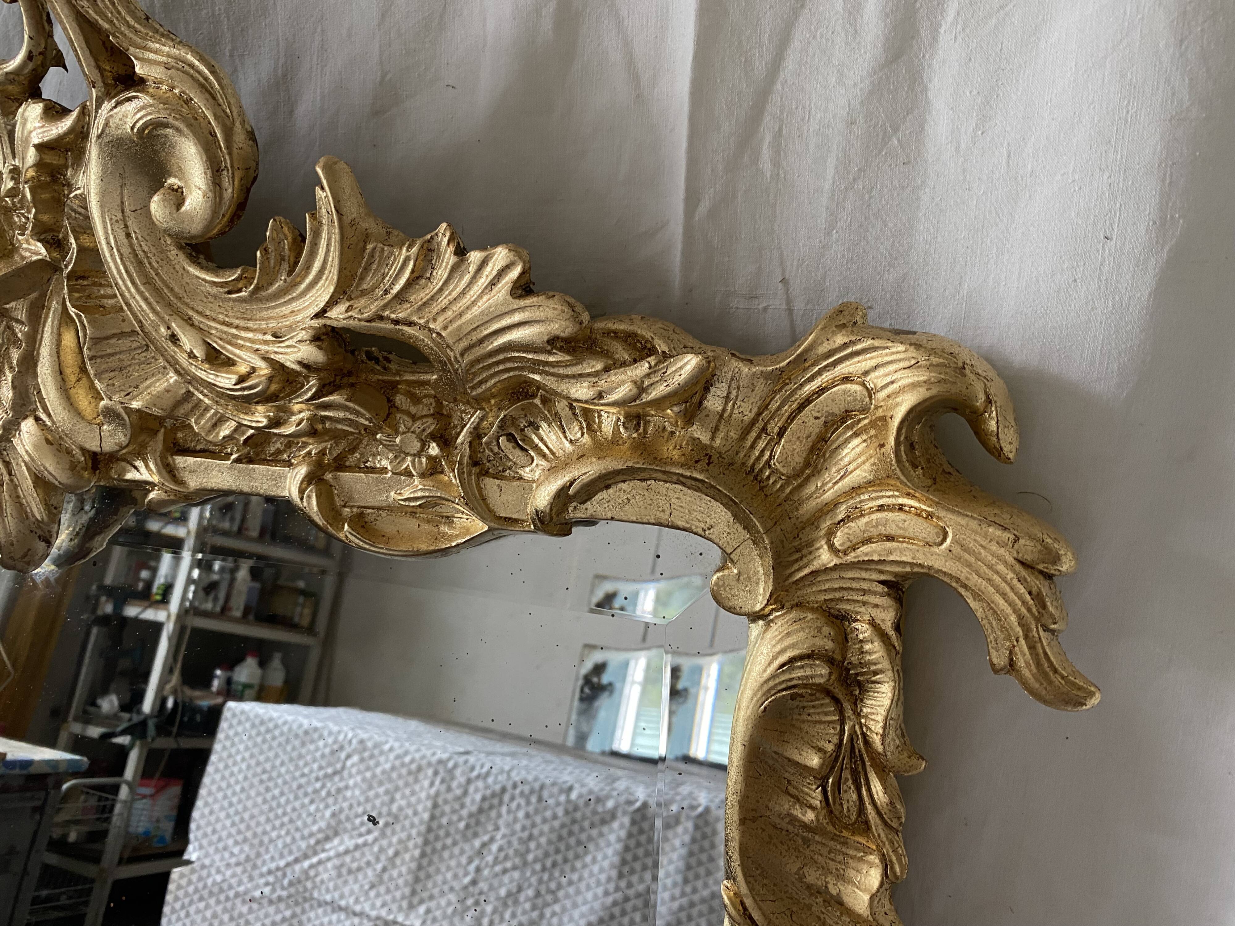19th century gilded mirror with pediment