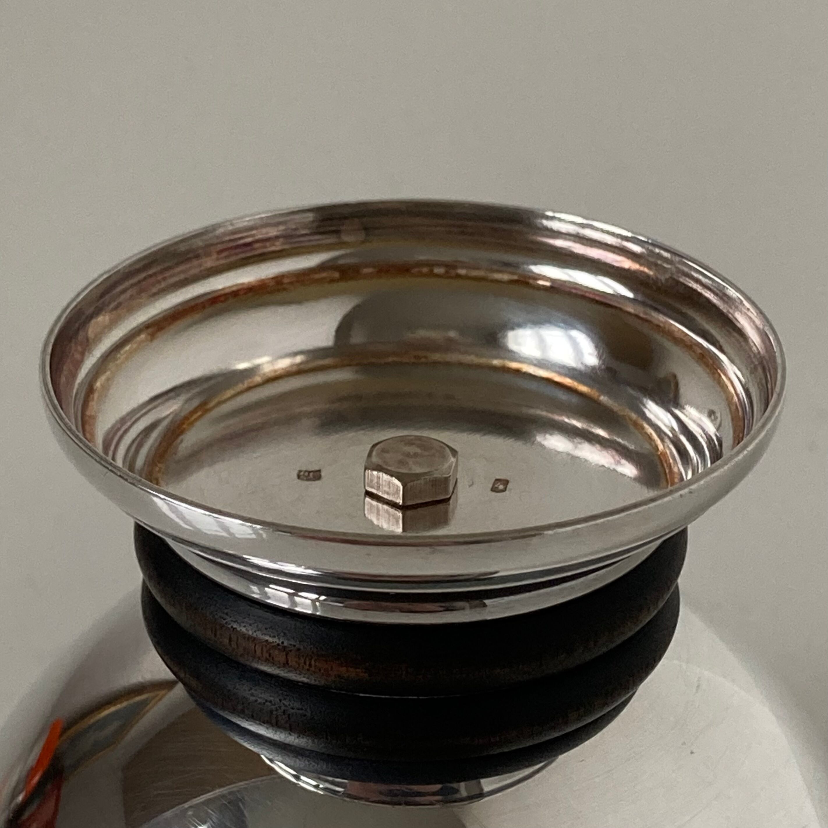 Beautiful Art Deco standing cup forming pocket trays in silver metal and blackened wood