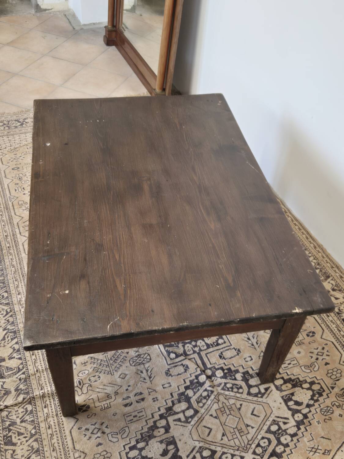 Rustic farmhouse coffee table from the 1900s with two drawers.