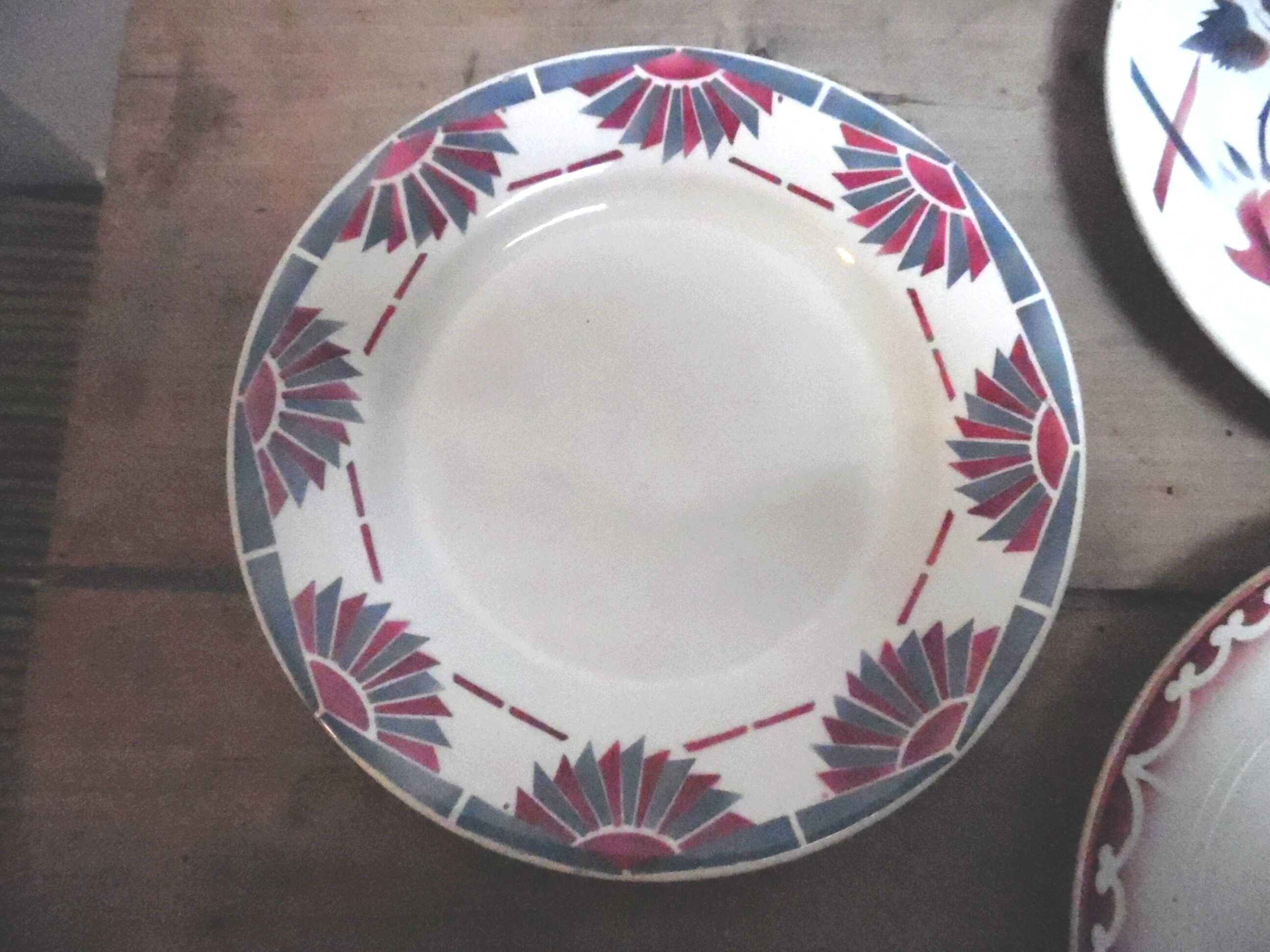 Six plates mismatched earthenware