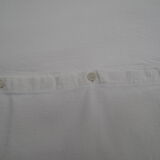 Paire de taies d'oreiller en toile blanche rustique brodées