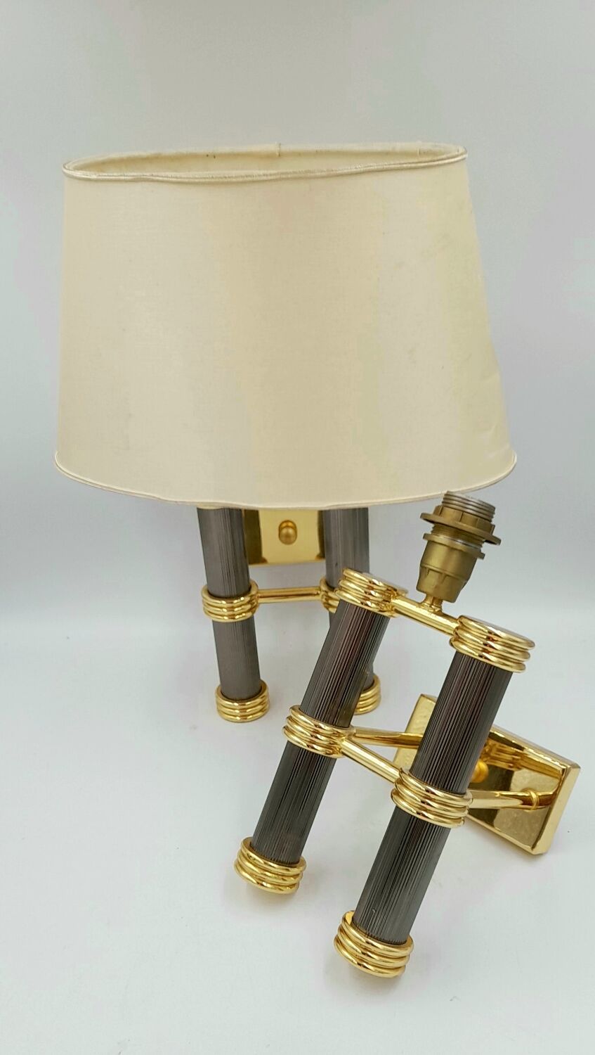 Pair of designer golden brass wall lights with gun barrel decor