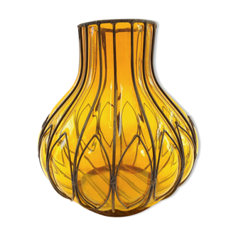 Blown glass vase with wrought iron frame