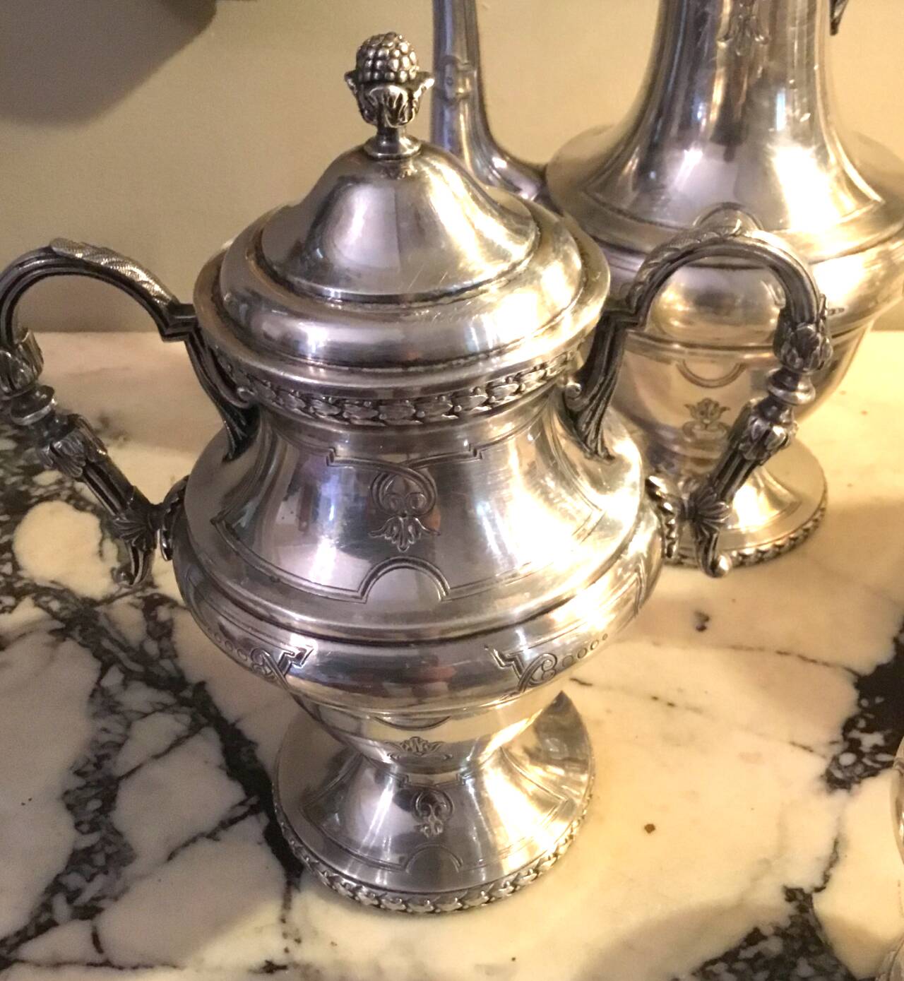 Silver-plated metal tea and coffee service in a 4-piece style.