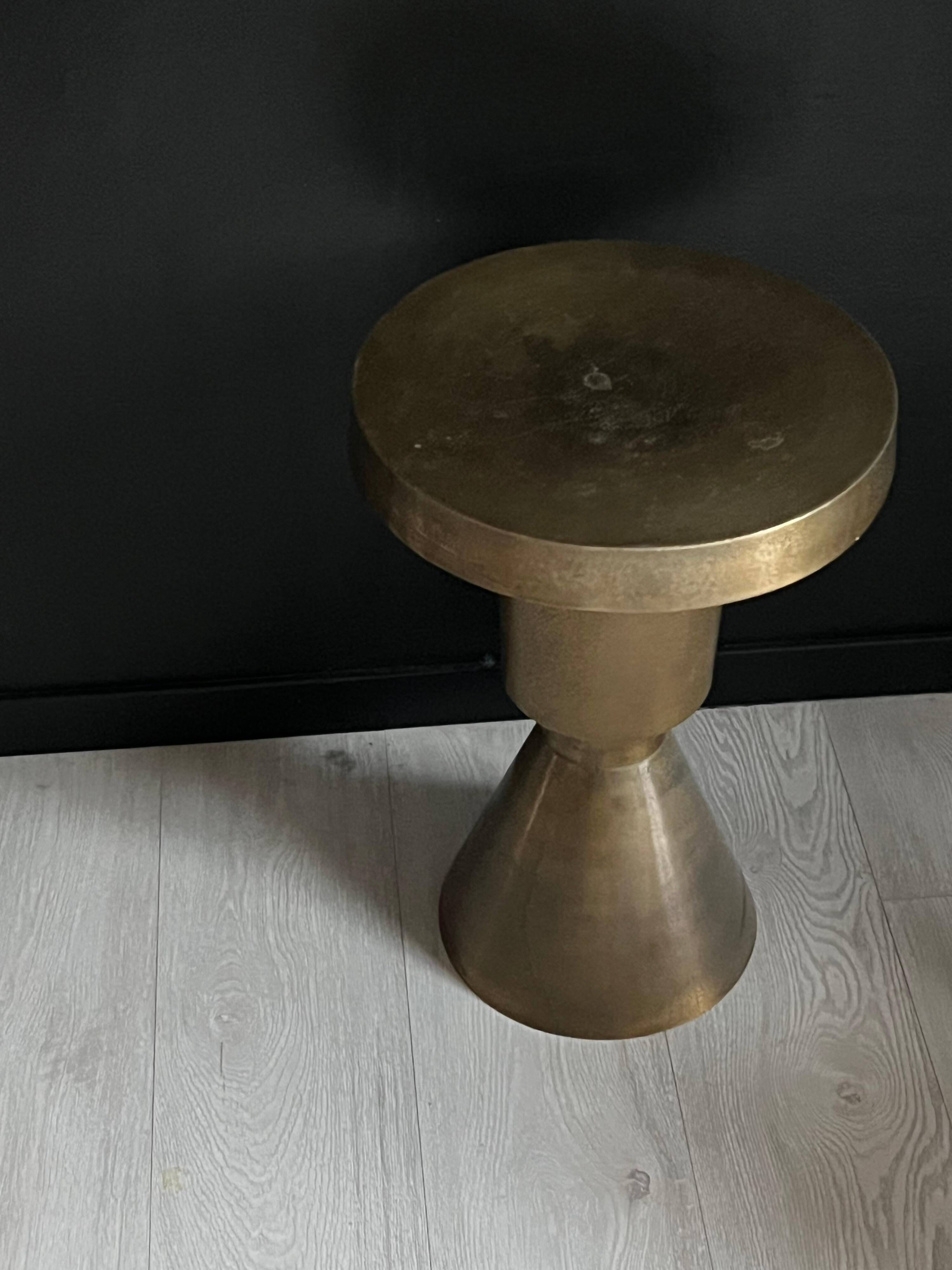 Sculptural metal side table, contemporary brassy side for modern interiors