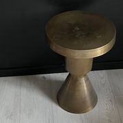Sculptural metal side table, contemporary brassy side for modern interiors