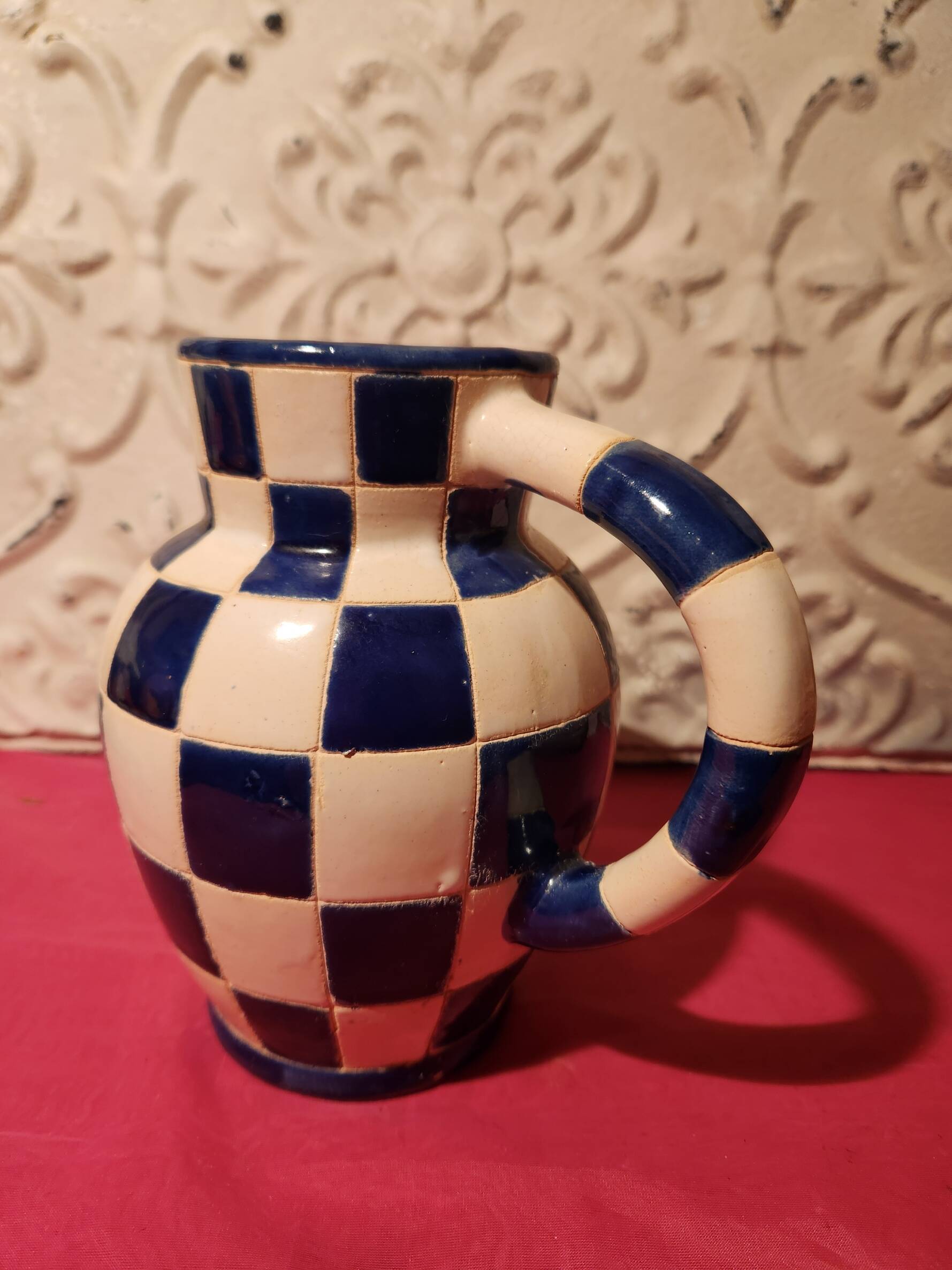 Ceramic jug with blue and white checkered pattern "Lustucru"