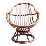Antique swivel rattan armchair