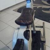 Old rocking horse in painted wood