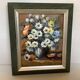 Small painting of a bouquet of flowers, oil on canvas.