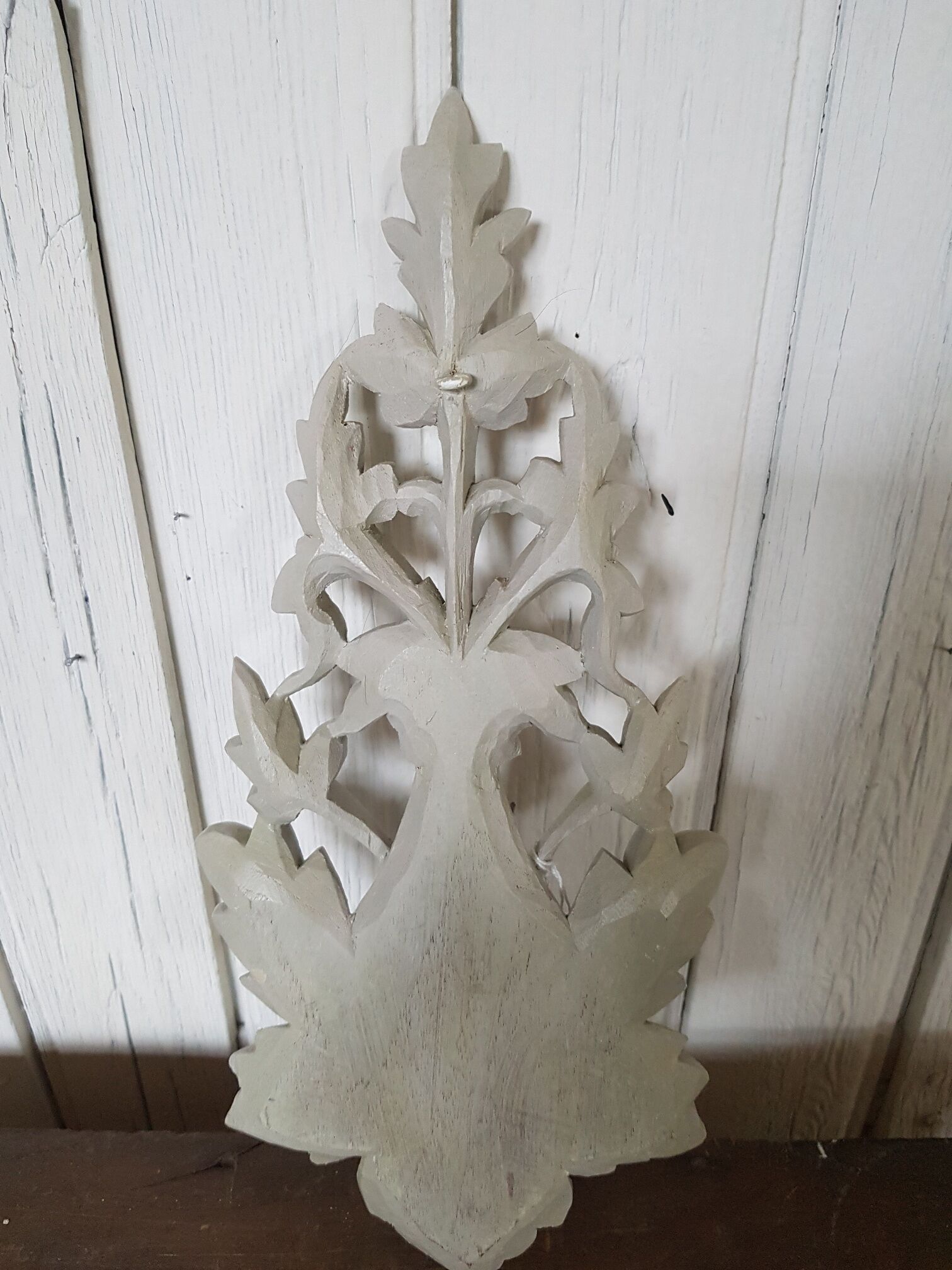 Grey patinated woodwork sculpture