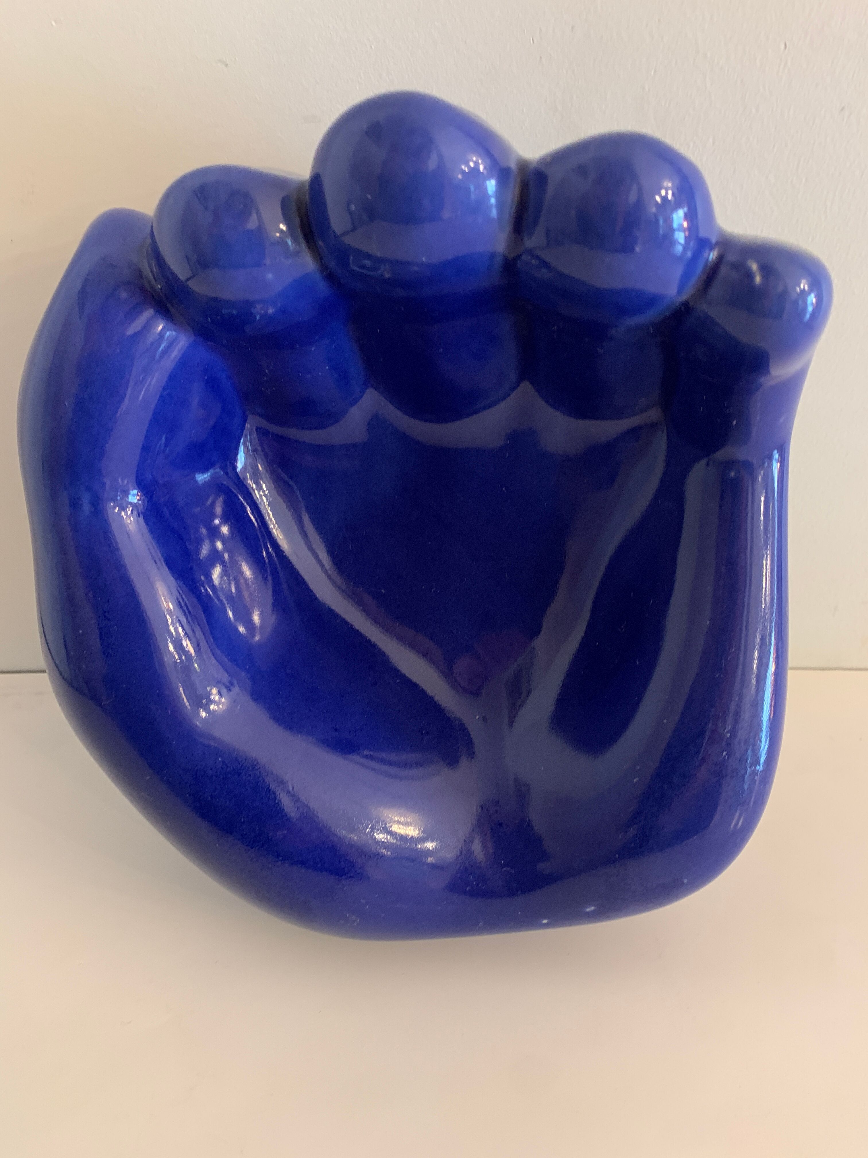 Ceramic ashtray, blue hand shape
