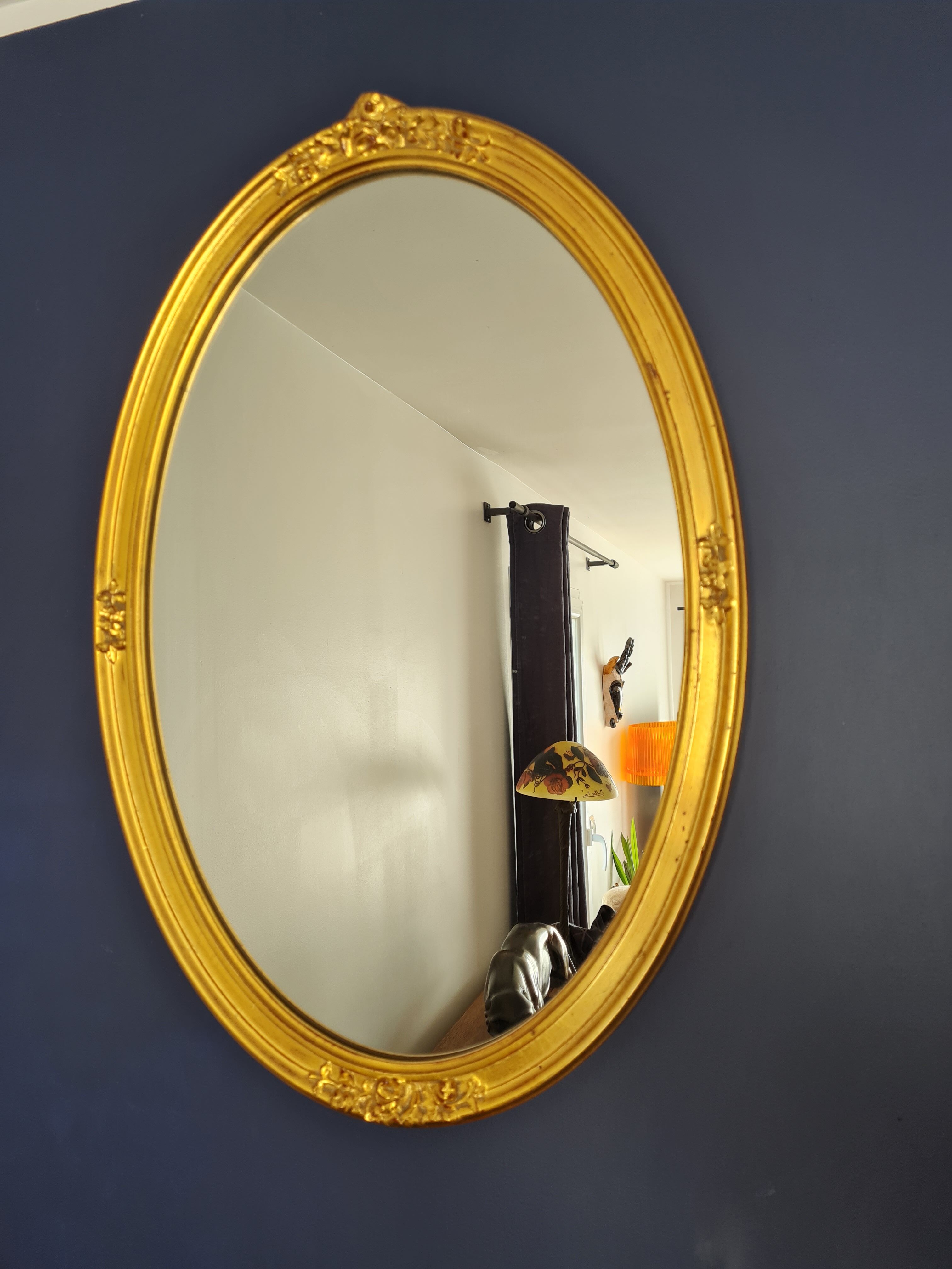 Large oval mirror gilded wood with red plate 44x66cm