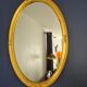 Large oval mirror gilded wood with red plate 44x66cm